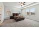 Spacious bedroom with tray ceiling and windows providing natural light at 2131 Landsburg Way, Lawrenceville, GA 30043