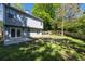 Spacious backyard with green lawn and wooden fence at 4266 Cabretta Se Dr, Smyrna, GA 30080