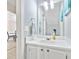 Small bathroom with white vanity and mirror at 4266 Cabretta Se Dr, Smyrna, GA 30080