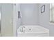 Bathroom with a large garden tub, perfect for relaxation at 4266 Cabretta Se Dr, Smyrna, GA 30080