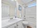 Clean bathroom with a shower/tub combo and white vanity at 4266 Cabretta Se Dr, Smyrna, GA 30080