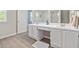 Double vanity bathroom with a walk-in shower and ample storage at 4266 Cabretta Se Dr, Smyrna, GA 30080