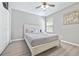 Bedroom with a full-size bed, ceiling fan, and hardwood floors at 4266 Cabretta Se Dr, Smyrna, GA 30080