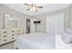Bright bedroom with a comfy bed, dresser, and mounted TV at 4266 Cabretta Se Dr, Smyrna, GA 30080
