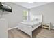 Bedroom with white bed frame and gray bedding at 4266 Cabretta Se Dr, Smyrna, GA 30080