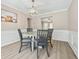 Dining room features a round table, chairs, and hardwood floors at 4266 Cabretta Se Dr, Smyrna, GA 30080