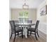 Bright dining room with a round table and four chairs at 4266 Cabretta Se Dr, Smyrna, GA 30080