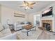 Living room features a fireplace, hardwood floors, and comfortable seating at 4266 Cabretta Se Dr, Smyrna, GA 30080