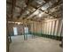 The unfinished basement is ready for customization, with framing, insulation, and a door to the outside at 1346 Lucan Ln # Wc227, Lawrenceville, GA 30043