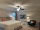 Bedroom features a queen bed, decorative accents, and carpeted floors at 1346 Lucan Ln # Wc227, Lawrenceville, GA 30043