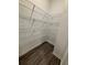 Walk-in pantry with ample shelving space for organized storage of food and household items at 1346 Lucan Ln # Wc227, Lawrenceville, GA 30043