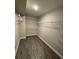 Walk-in closet with hardwood floors and wire shelving at 1346 Lucan Ln # Wc227, Lawrenceville, GA 30043