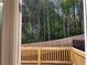 View of backyard with wooden fence and lush green trees at 1366 Lucan Ln # Wc225, Lawrenceville, GA 30043