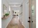 Inviting entryway with open floor plan, decorative mirror and hardwood floors at 1366 Lucan Ln # Wc225, Lawrenceville, GA 30043