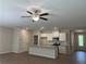 Modern kitchen featuring a large center island, stainless steel appliances, and ample lighting at 1366 Lucan Ln # Wc225, Lawrenceville, GA 30043