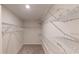 Organized walk-in closet featuring wire shelving and ample storage space at 1366 Lucan Ln # Wc225, Lawrenceville, GA 30043