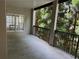 Open-air balcony includes black metal railing and concrete flooring with treelined views for privacy at 50 Biscayne Dr # 2109, Atlanta, GA 30309