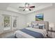 Spacious bedroom with plush bed and access to a private balcony at 50 Biscayne Dr # 2109, Atlanta, GA 30309