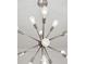 Close-up of a modern, multi-light chandelier at 50 Biscayne Dr # 2109, Atlanta, GA 30309