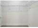 Basic closet with wire shelving for hanging clothes at 50 Biscayne Dr # 2109, Atlanta, GA 30309