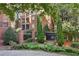 Beautifully landscaped entrance to The Manor House condominium complex on Fifty Biscayne at 50 Biscayne Dr # 2109, Atlanta, GA 30309