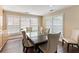 Elegant dining room with wood floors, large windows, and a classic table for entertaining guests at 50 Biscayne Dr # 2109, Atlanta, GA 30309