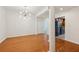 Bright dining room with hardwood floors and modern chandelier at 50 Biscayne Dr # 2109, Atlanta, GA 30309