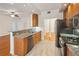 Modern kitchen featuring stainless appliances, granite countertops and open floorplan at 50 Biscayne Dr # 2109, Atlanta, GA 30309