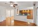 Open living room featuring hardwood floors and open view to kitchen at 50 Biscayne Dr # 2109, Atlanta, GA 30309