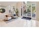 Elegant lobby with seating area and view of the courtyard at 50 Biscayne Dr # 2109, Atlanta, GA 30309