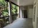 Large patio featuring black metal railings, privacy screen and view of greenery at 50 Biscayne Dr # 2109, Atlanta, GA 30309