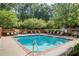 Inviting community pool with lounge chairs at 50 Biscayne Dr # 2109, Atlanta, GA 30309