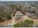 Aerial view of a property nestled among trees, showcasing its spacious lot at 3421 Fawn Trl, Marietta, GA 30066