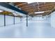 Open unfinished basement featuring high ceilings, white walls, with exposed beams and ductwork at 3421 Fawn Trl, Marietta, GA 30066