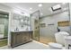 A modern bathroom features an updated vanity, glass shower, and soaking tub at 3421 Fawn Trl, Marietta, GA 30066