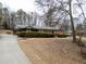 Brick ranch-style home with mature landscaping, large front yard, and long driveway at 3421 Fawn Trl, Marietta, GA 30066