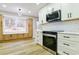 Updated kitchen featuring stainless steel appliances and white countertops at 3421 Fawn Trl, Marietta, GA 30066