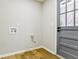 Laundry room with washer and dryer hookups and access to the outside at 3421 Fawn Trl, Marietta, GA 30066
