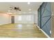 Spacious living room features hardwood floors, two large windows and decorative wall feature at 3421 Fawn Trl, Marietta, GA 30066