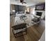 Bright living room featuring a white brick fireplace and stylish furnishings at 3421 Fawn Trl, Marietta, GA 30066