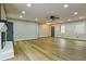 Bright living room with hardwood floors, recessed lighting, and fireplace at 3421 Fawn Trl, Marietta, GA 30066