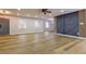 Open living area showcasing wood floors and natural light from large windows at 3421 Fawn Trl, Marietta, GA 30066