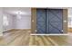 Spacious living area featuring hardwood floors and geometric wall design at 3421 Fawn Trl, Marietta, GA 30066