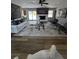 Stylish living room with modern decor, fireplace, and sliding glass doors to the outside at 3421 Fawn Trl, Marietta, GA 30066
