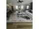 Sunlit living room with a decorative rug, modern furniture and hardwood flooring at 3421 Fawn Trl, Marietta, GA 30066