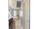 Bathroom with soaking tub and double vanity at 4248 Hog Mountain Rd, Hoschton, GA 30548