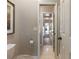 Clean bathroom with toilet and access to hallway at 4248 Hog Mountain Rd, Hoschton, GA 30548
