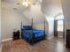 Charming bedroom with a full-size bed and hardwood floors at 4248 Hog Mountain Rd, Hoschton, GA 30548