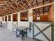 Spacious horse stables with multiple stalls, each with its own door and window at 4248 Hog Mountain Rd, Hoschton, GA 30548