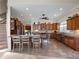 Modern kitchen with wood cabinets and granite countertops at 4248 Hog Mountain Rd, Hoschton, GA 30548